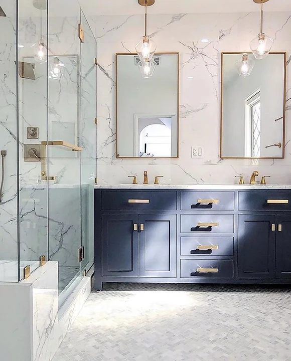 A finished bathroom remodel by RM Construction and Design.