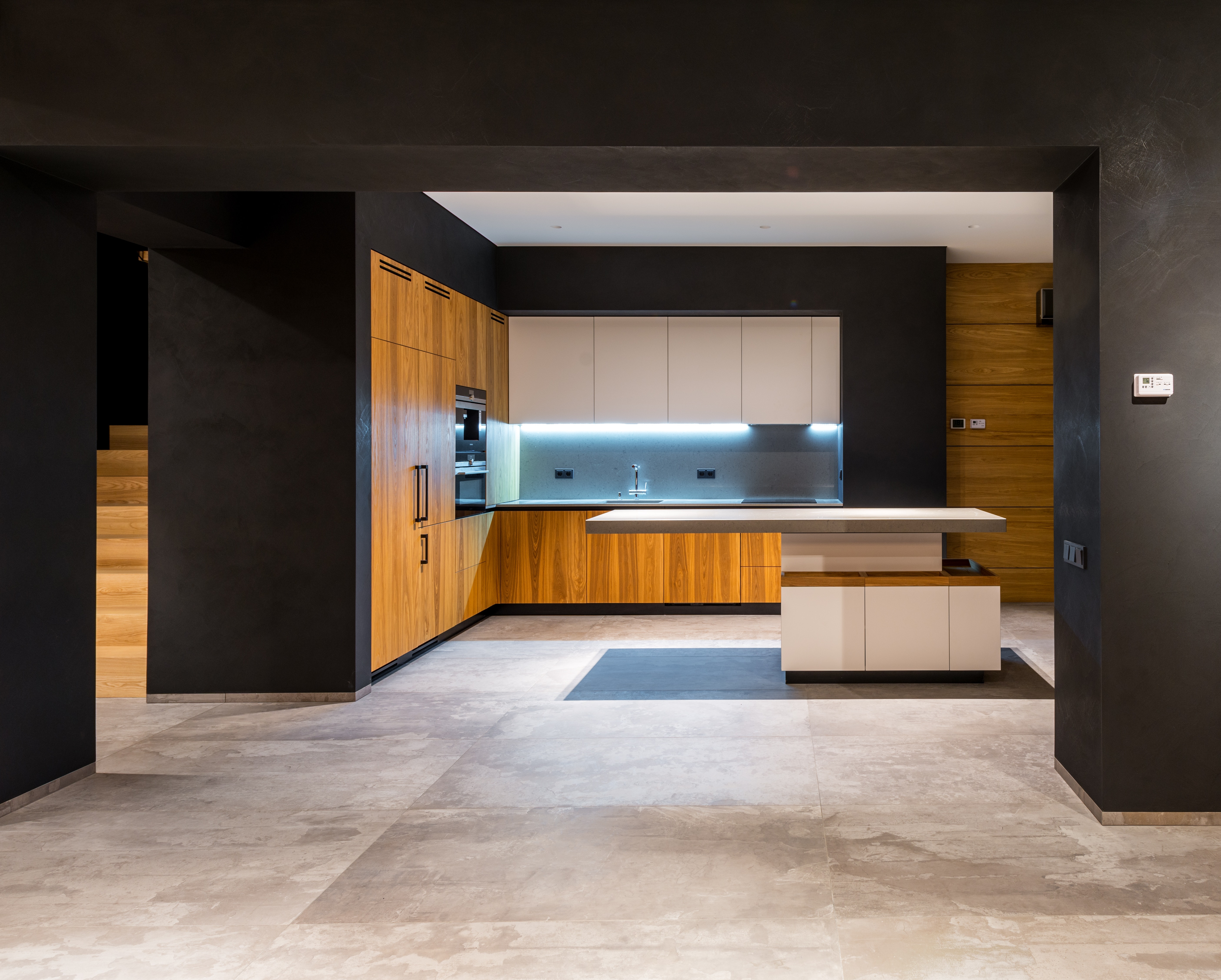 A finished contemporary kitchen remodel by RM Construction and Design.